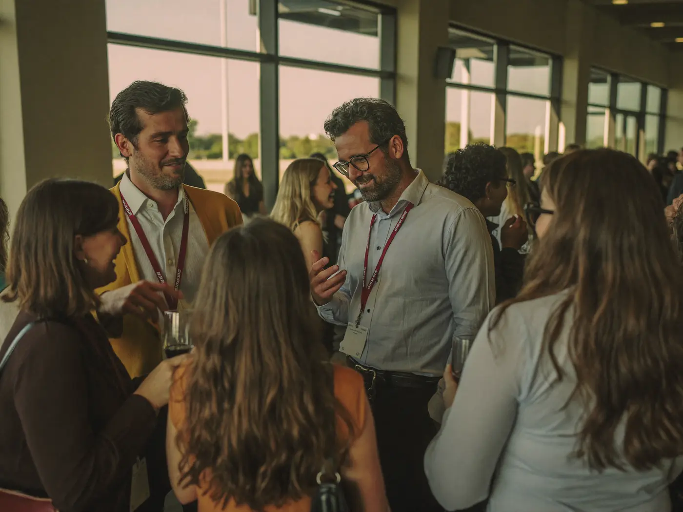 Members talking at a networking reception
